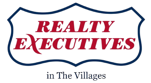 A logo for realty executives in the villages