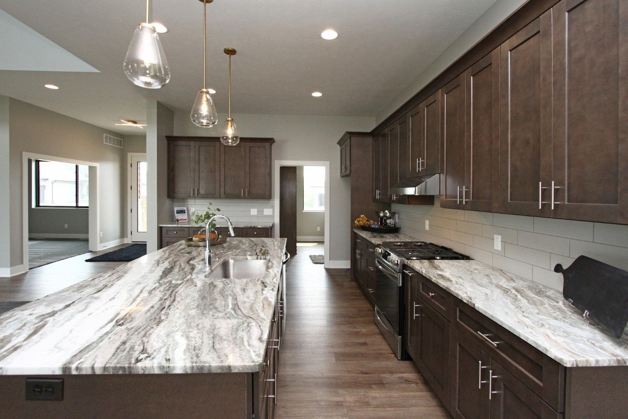 Modern Kitchen With Marble Island.