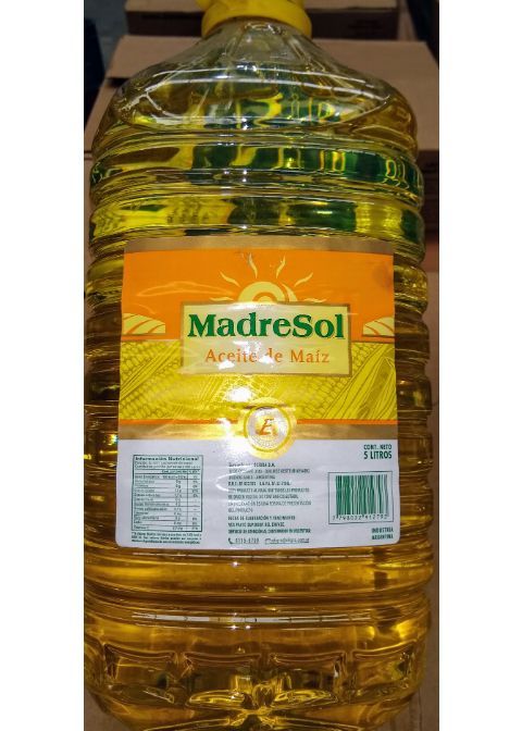 Botella grande amarilla de vinagre de sidra de manzana MadreSol con etiqueta verde y naranja.