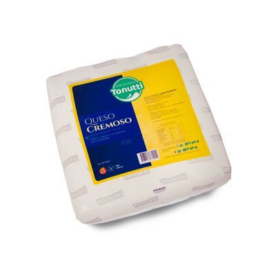 Queso cremoso Tonut envasado en blanco con etiqueta azul y amarilla.