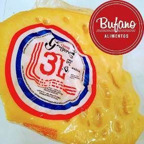 Producto alimenticio envasado en amarillo con etiqueta roja y blanca que dice “31” y “Bufano Alimentos”.
