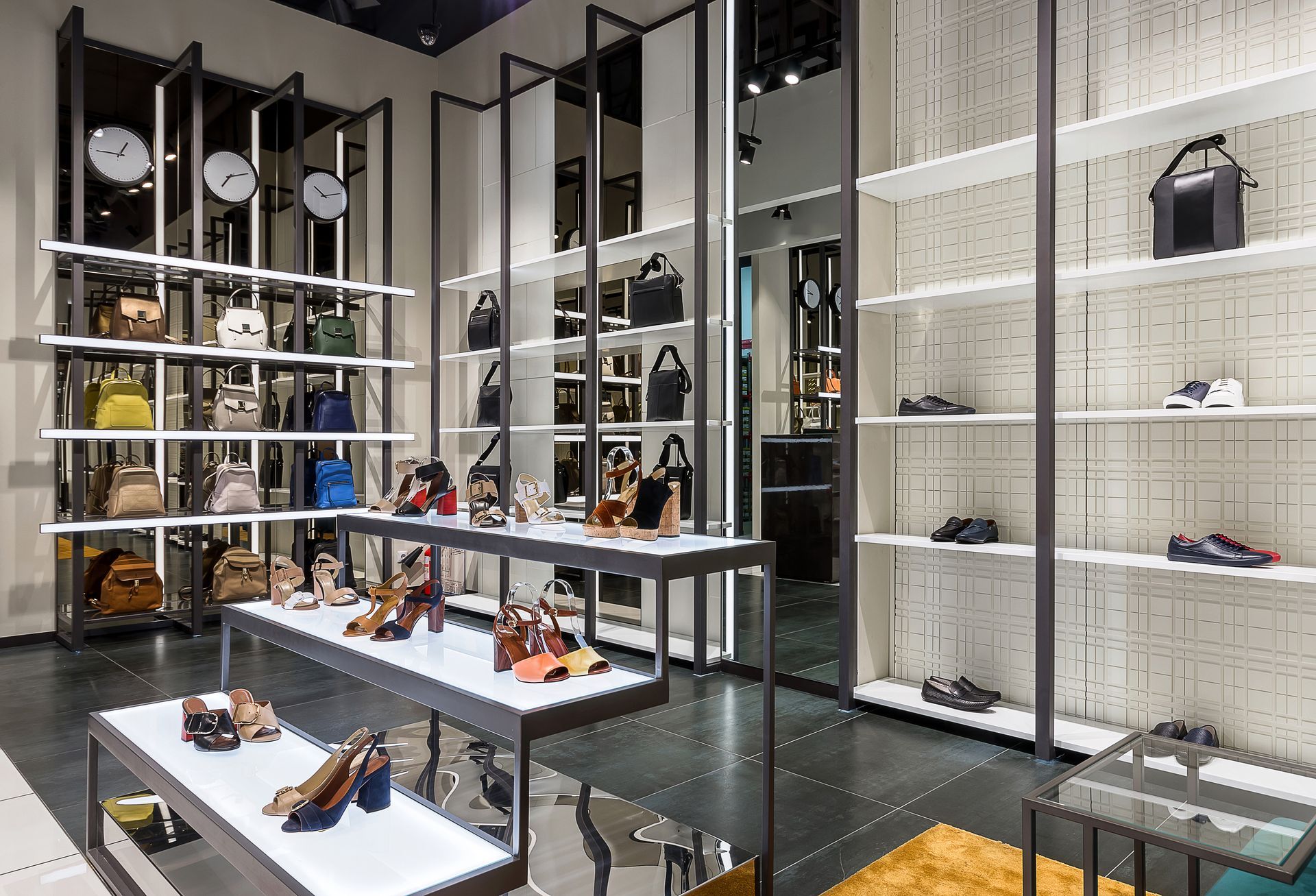 Bright large shoe store with a new collection of purses and shoes.