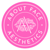 A pink circle with the words about face aesthetics inside of it