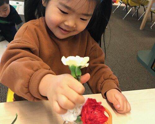 Child working on a Montessori Sensorial activity