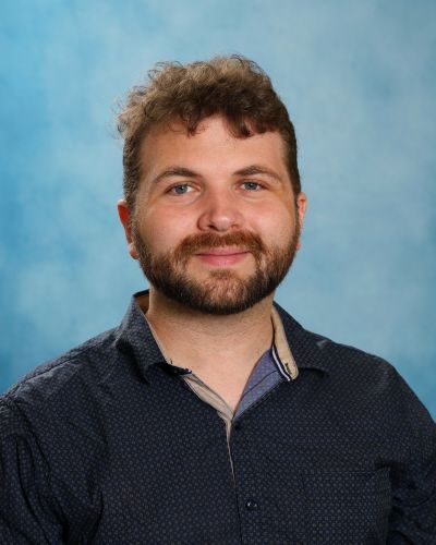 Clark Harrell, Front Desk Administrator