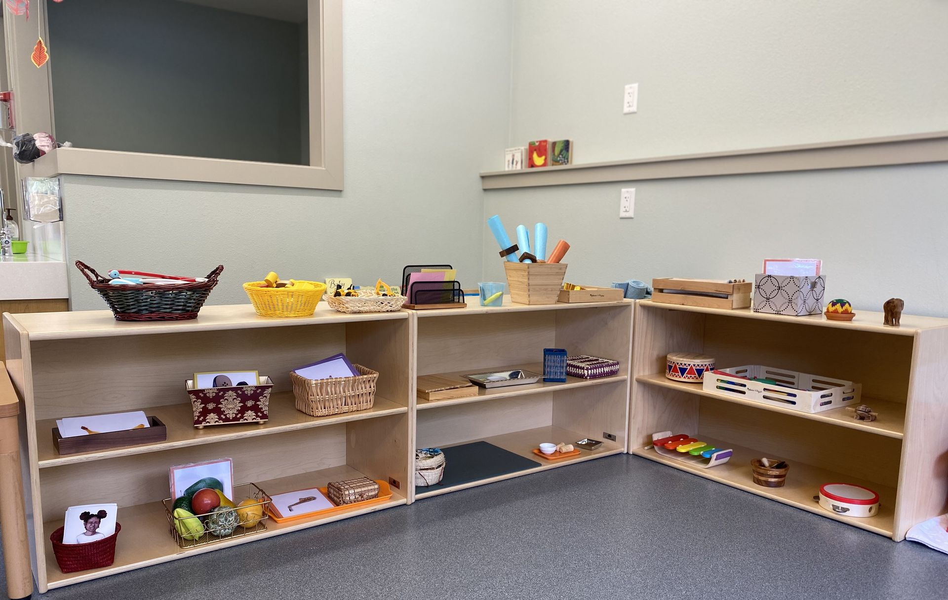 Child working with a Montessori materials