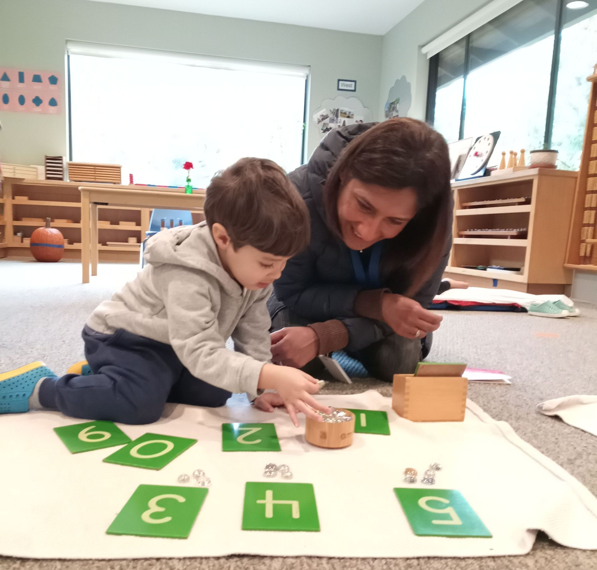 Child working with Montessori math materials