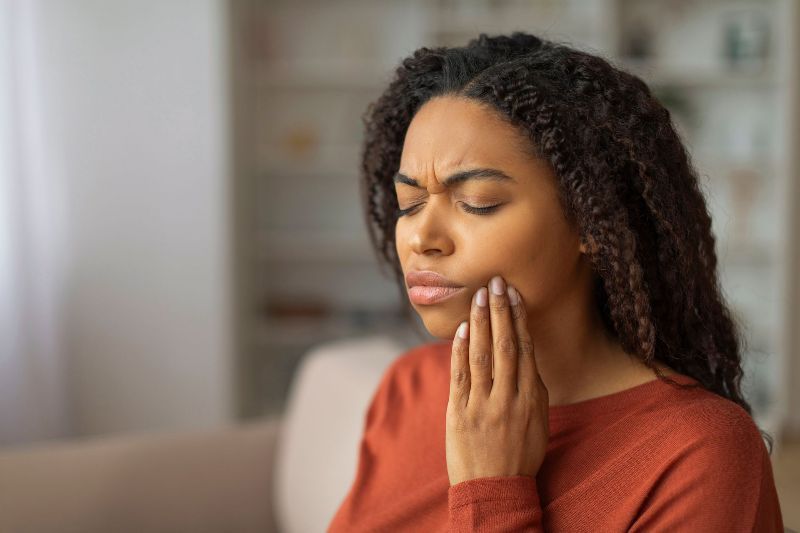 Woman with tooth pain