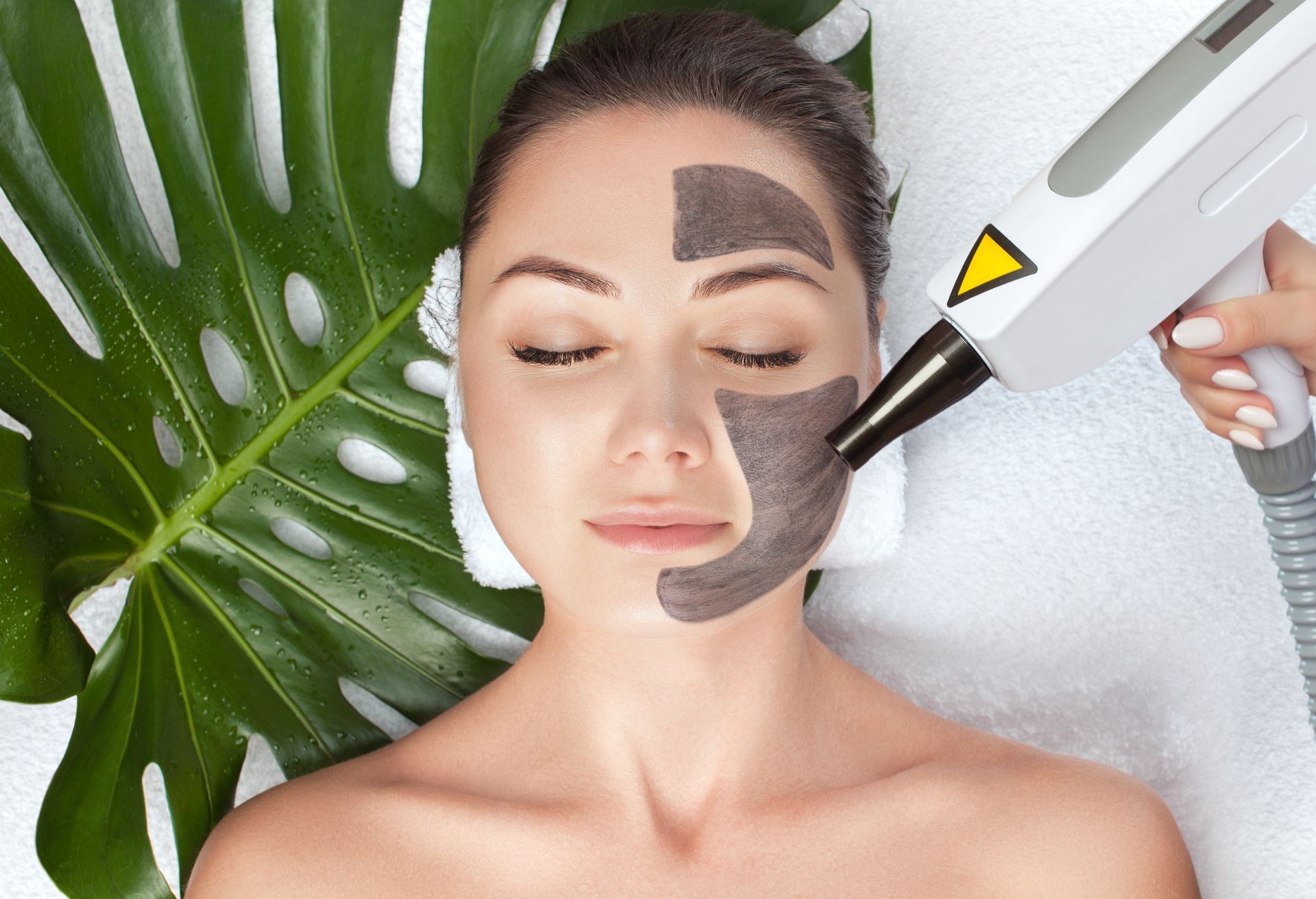 Woman Having a Carbon Facial Treatment with Laser Device — Pink Lily Beauty in Blacksmiths, NSW