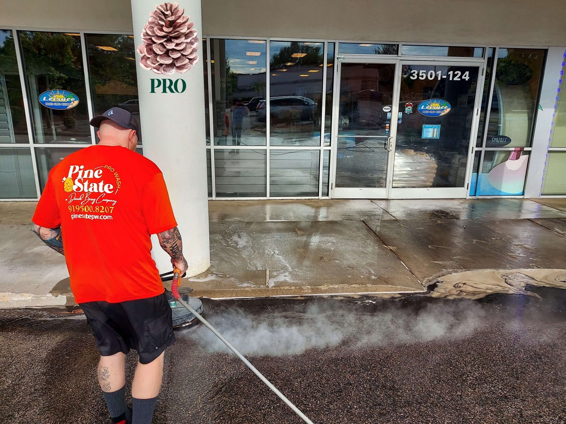 Pinestate Pro Wash cleaing a chemical spill in front of a commercial property in Raleigh, NC