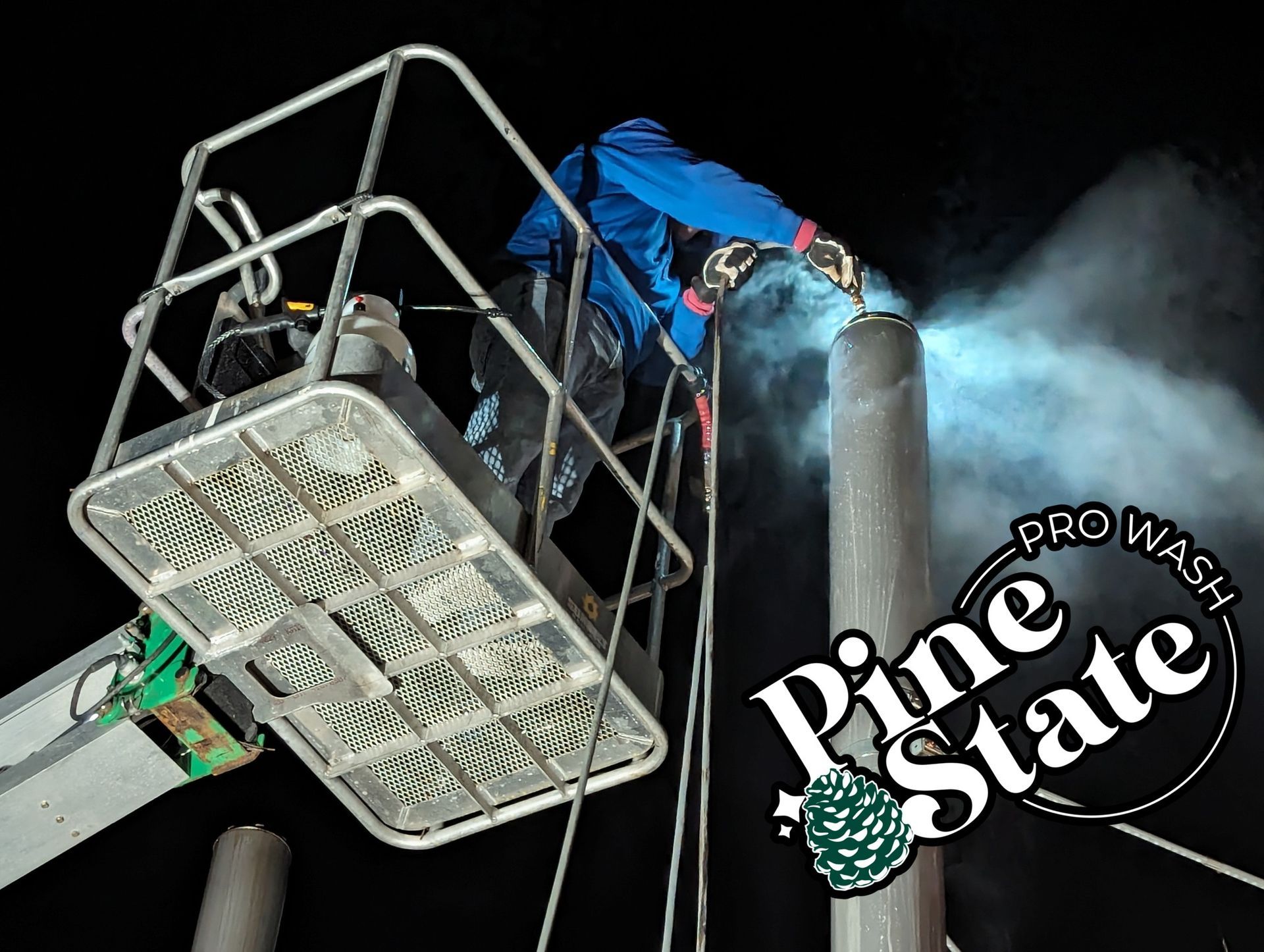 Pinestate Pro Wash pressure washing a restaurant smoke stack in Raleigh, NC