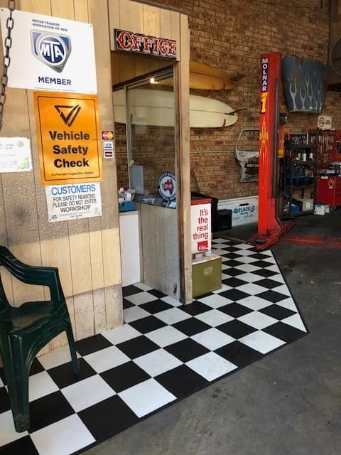 A Checkered Floor in a Garage — Coastal Automotive Services Long Jetty in Long Jetty, NSW