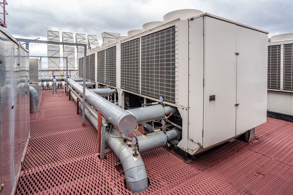 Air Cooled Water Chiller Installed with Pipework — Air Conditioning Repairs in Nowra NSW