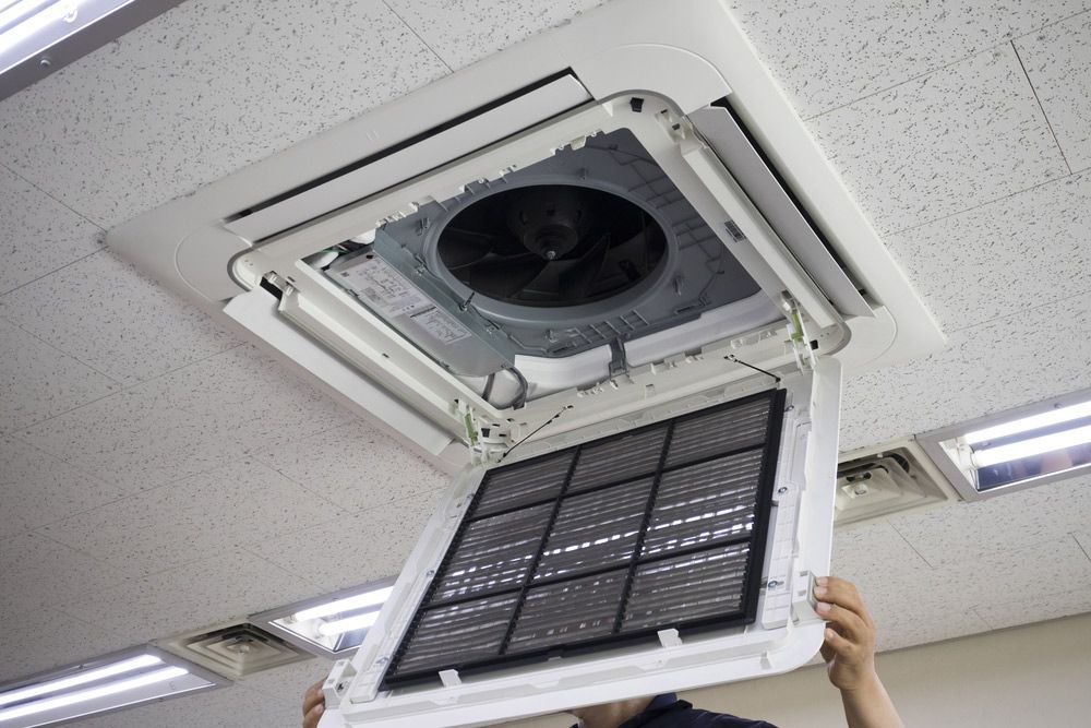 Cleaning the air conditioner — Air Conditioning Repairs in Huskisson NSW