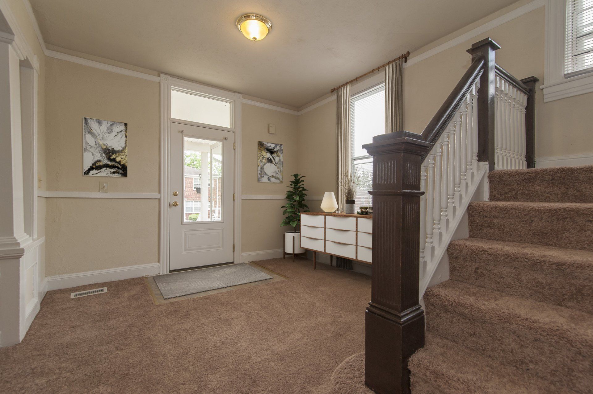 Entryway of Oaklee Village with staircase