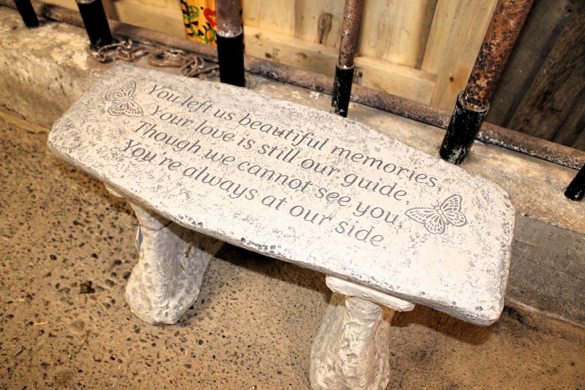 Stone bench with inscription: 