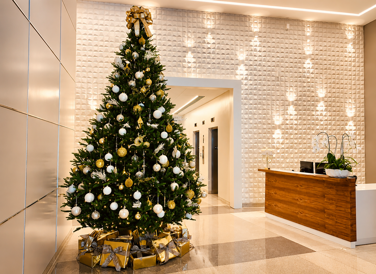 Decorated Christmas tree in a modern office lobby beside a reception desk