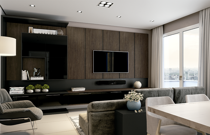 Uma sala com sofá, cadeiras, mesa e televisão.