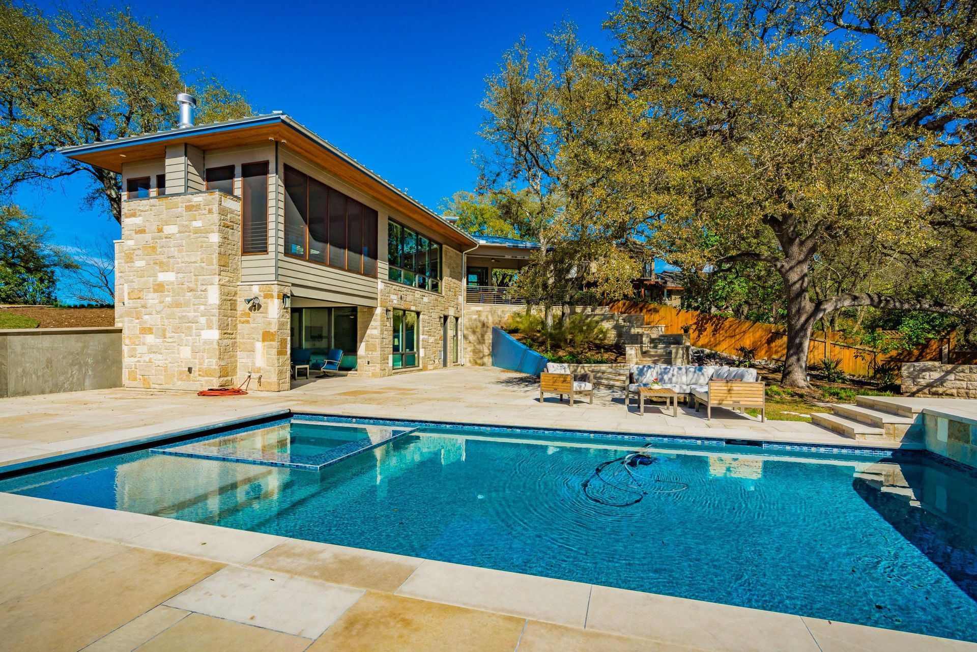 Modern house with a swimming pool on a sunny day.