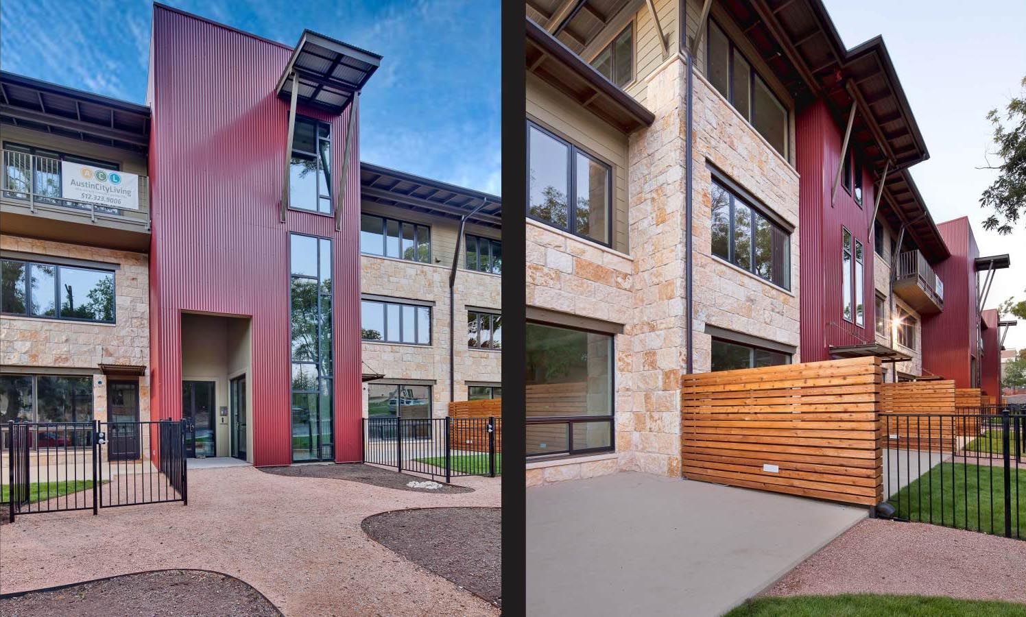 Two-story modern buildings with stone and reddish-brown metal facade; pathway with gravel, and black metal fence.