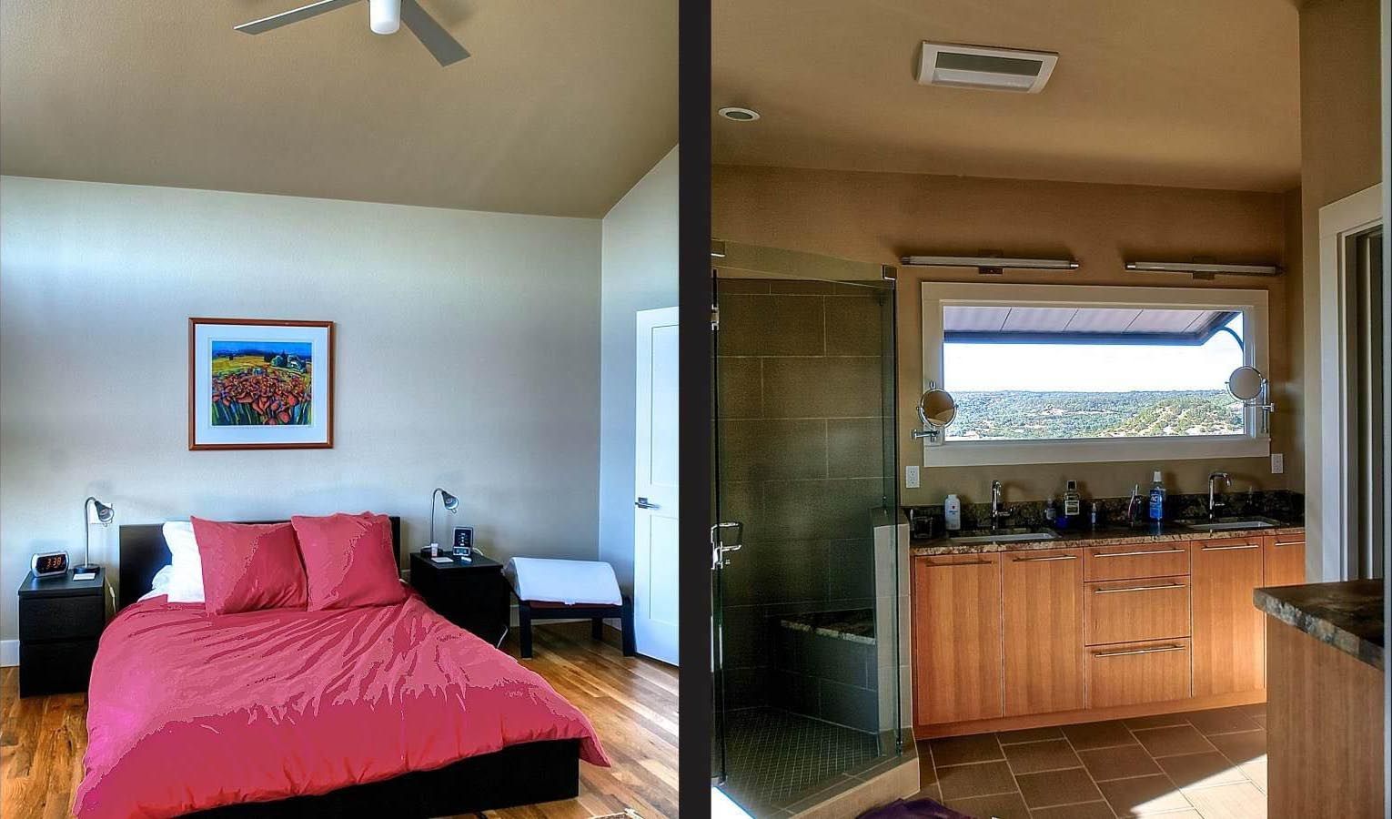 Bedroom and bathroom side by side. Bedroom has red bedding, art, and a dark nightstand. Bathroom has wood cabinets