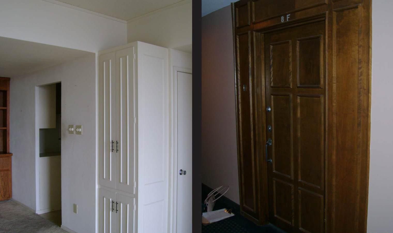 Two interior walls. One white with a tall cabinet, the other dark wood with a door.