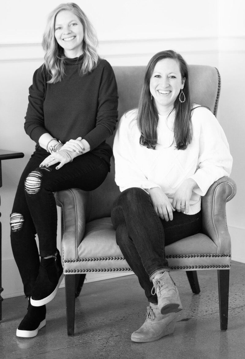 Black and white photo of Lauren Montgomery Simpson and Alex Peeples Hunt sitting in chair
