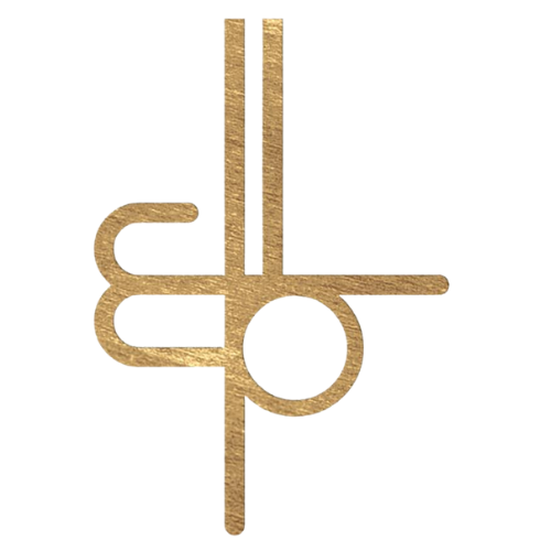 Gold-colored abstract logo. It features stylized shapes including a circle, lines, and curves.