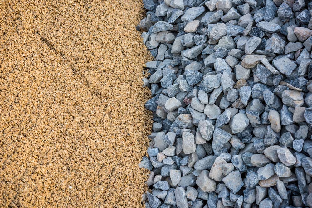 Construction Sand Pile And Rocks — Landscape Supplies in Tweeds Heads South, NSW