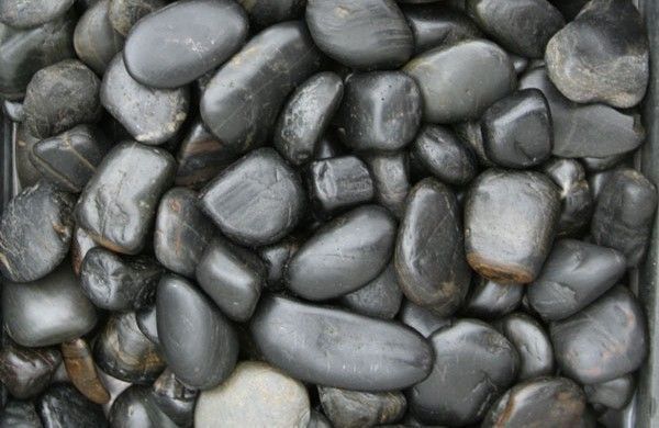 Black Polished Pebbles 20kg Bags — Tweed Landscape Supplies in Tweed Heads, NSW