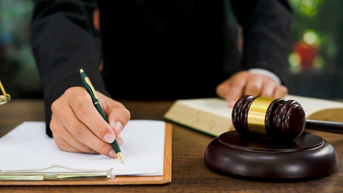 Signing Document — Goshen, NY —  John E. Bach Jr. Attorney at Law