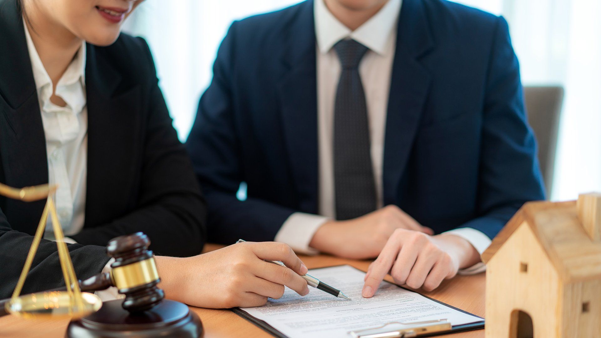 Discussing Document — Goshen, NY — John E. Bach Jr. Attorney at Law Discussing Document — Goshen, NY — John E. Bach Jr. Attorney at Law