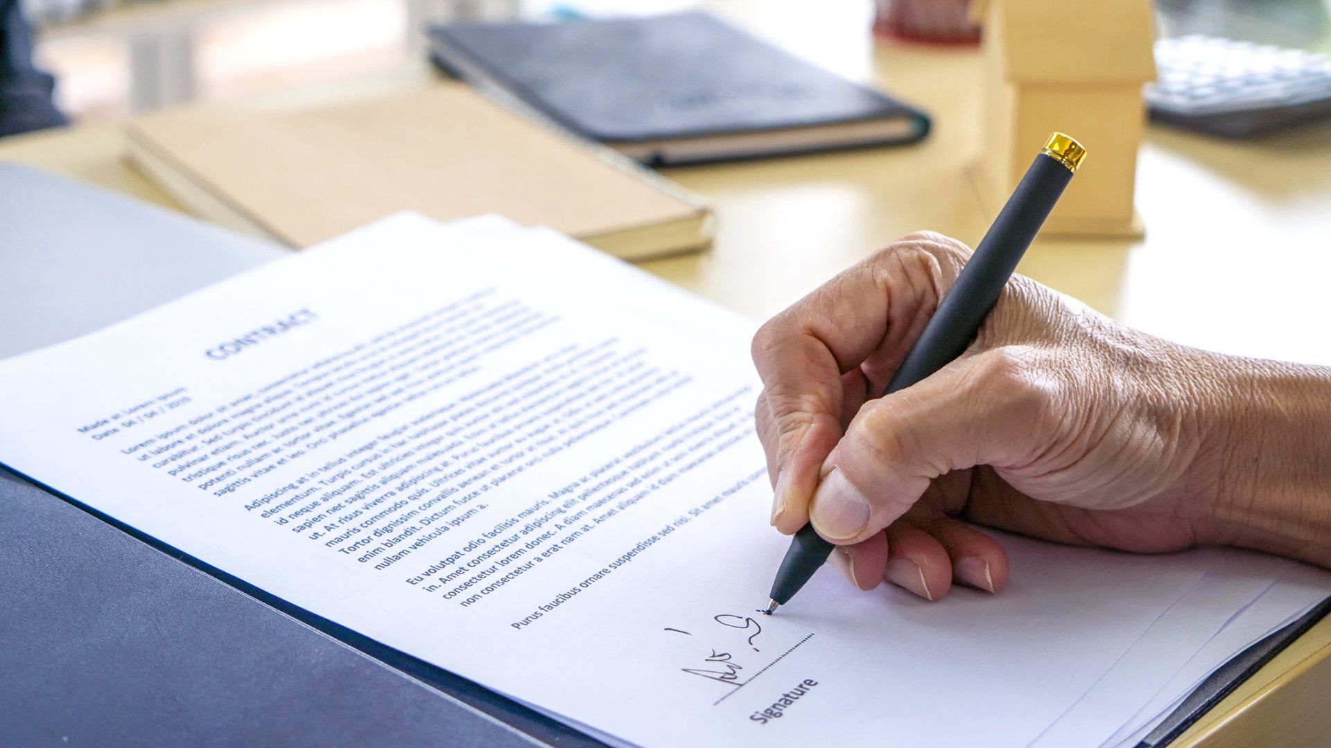 Signing Contract — Goshen, NY — John E. Bach Jr. Attorney at Law Signing Contract — Goshen, NY — John E. Bach Jr. Attorney at Law