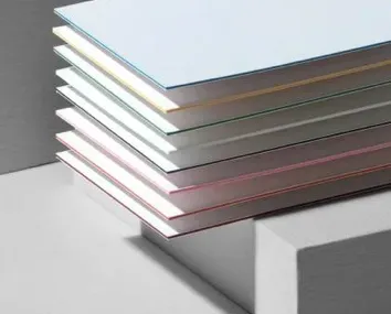 Stack of colored, rectangular paper sheets: light blue, gold, white, gray, pink.