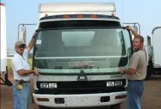 Two People Holding Truck | Enterprise, AL | Watson Glass