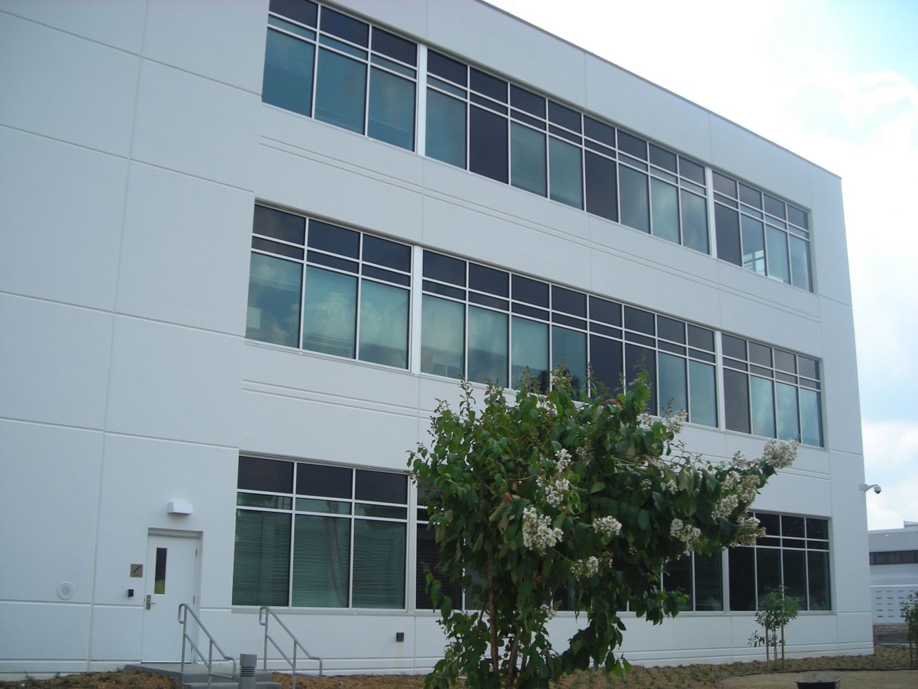 Three Story Building With White Glass | Enterprise, AL | Watson Glass