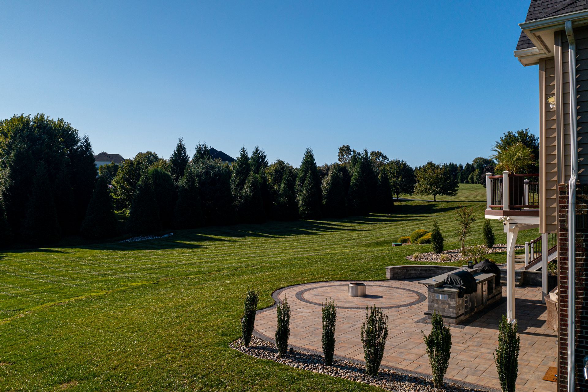 photo of backyard with complete patio install by X2N in Maryland