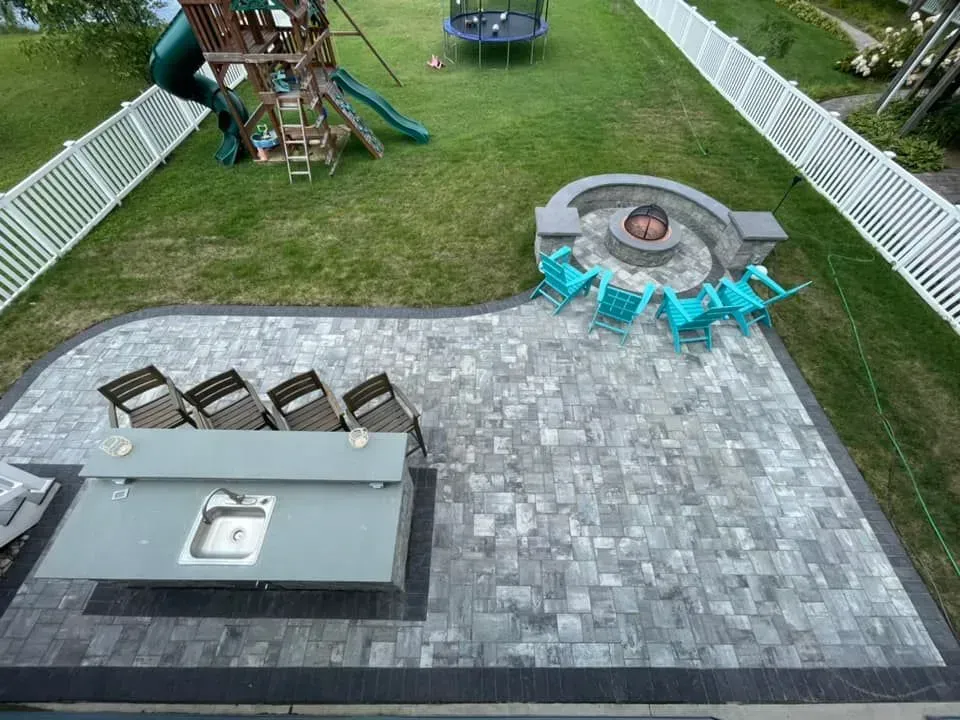 Large patio with fire pit and outdoor kitchen 