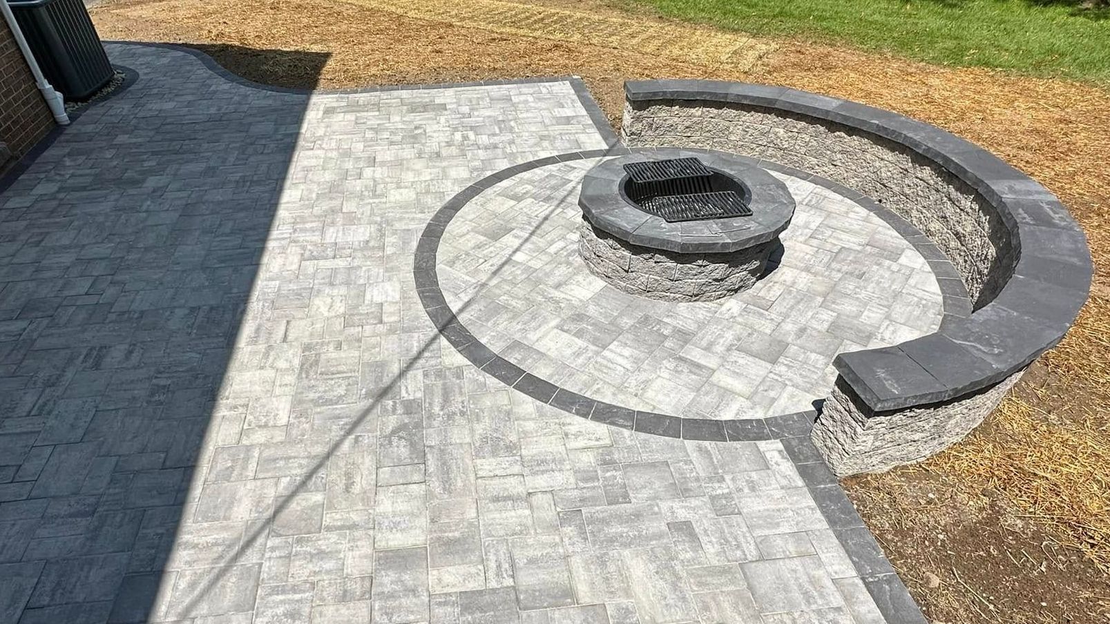 New patio and fireplace hardscaping by X2N
