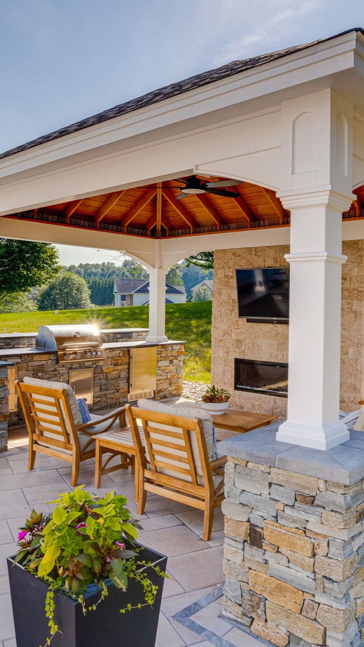 Custom pavilion covering a hardscape patio at a Towson Maryland home
