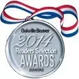 A silver medal with a red , white and blue ribbon around it.