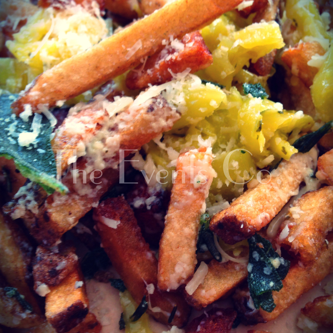A close up of a plate of food that says the event