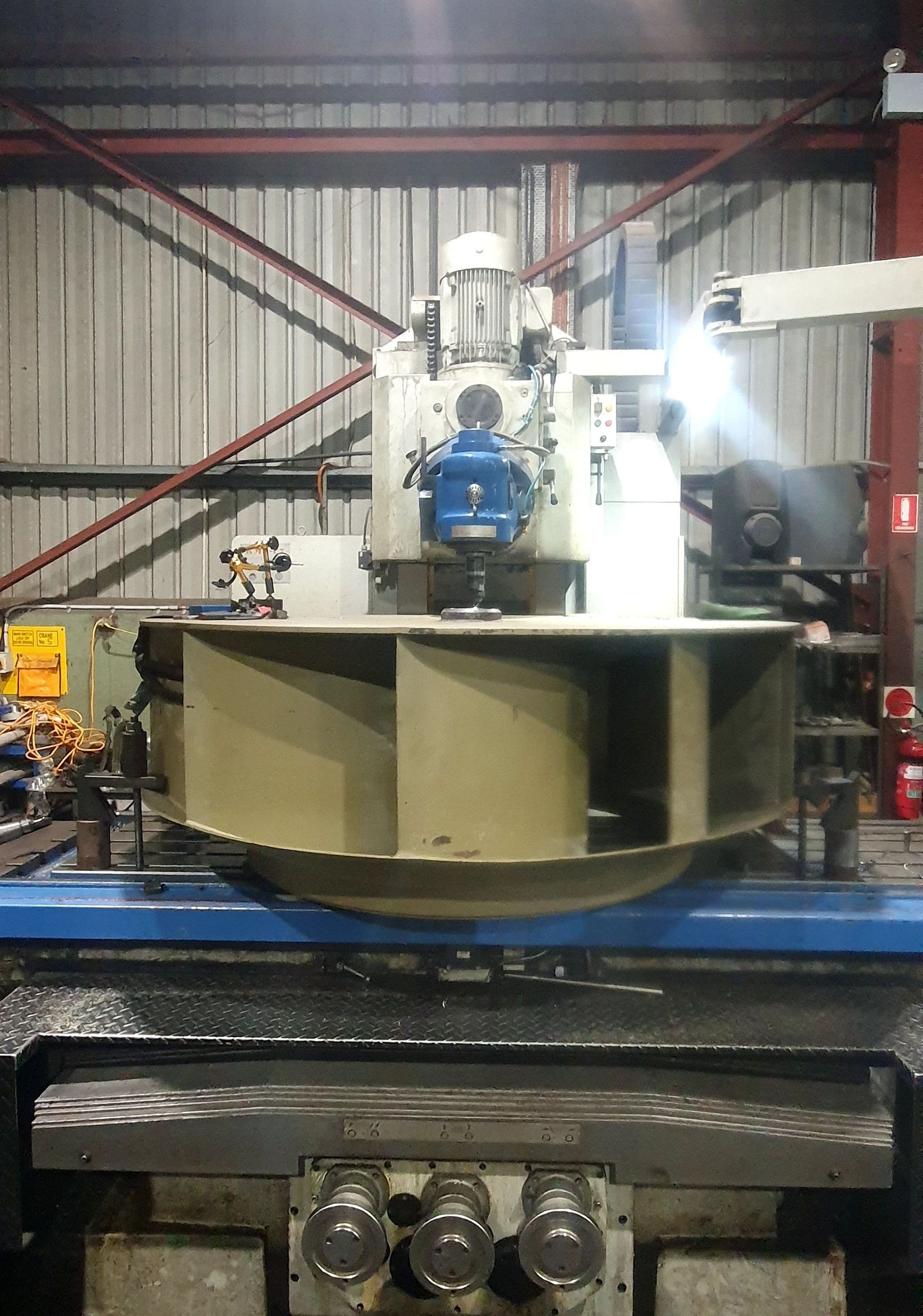 A large machine is sitting in a dark room