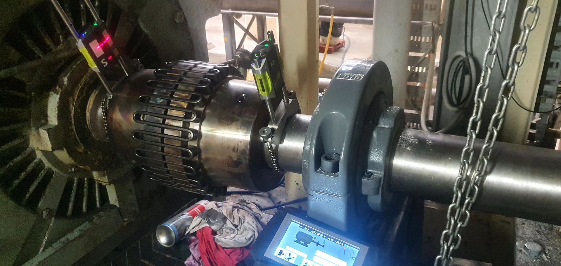 A close up of a machine with a chain around it.