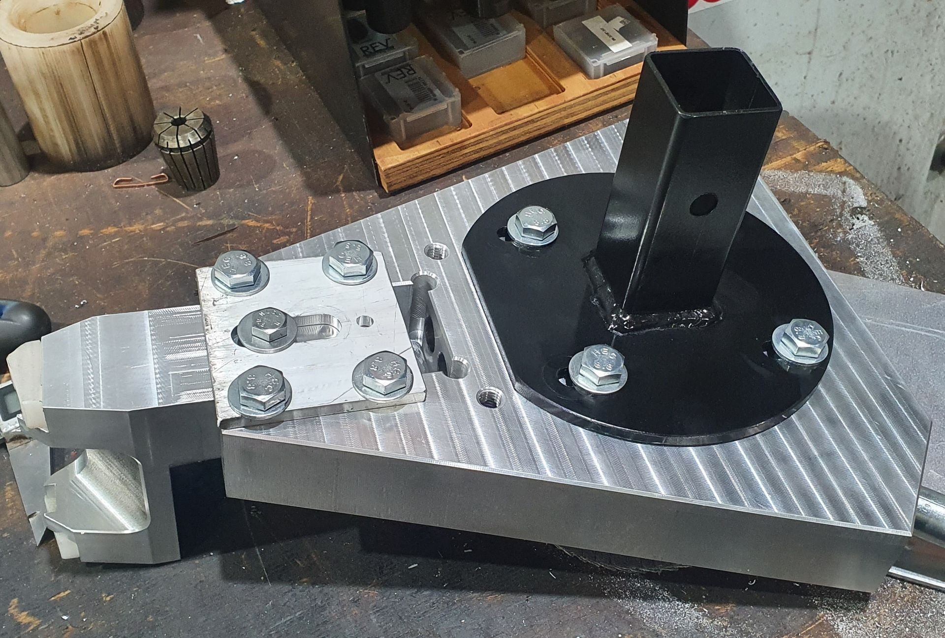 A piece of metal is sitting on top of a table.