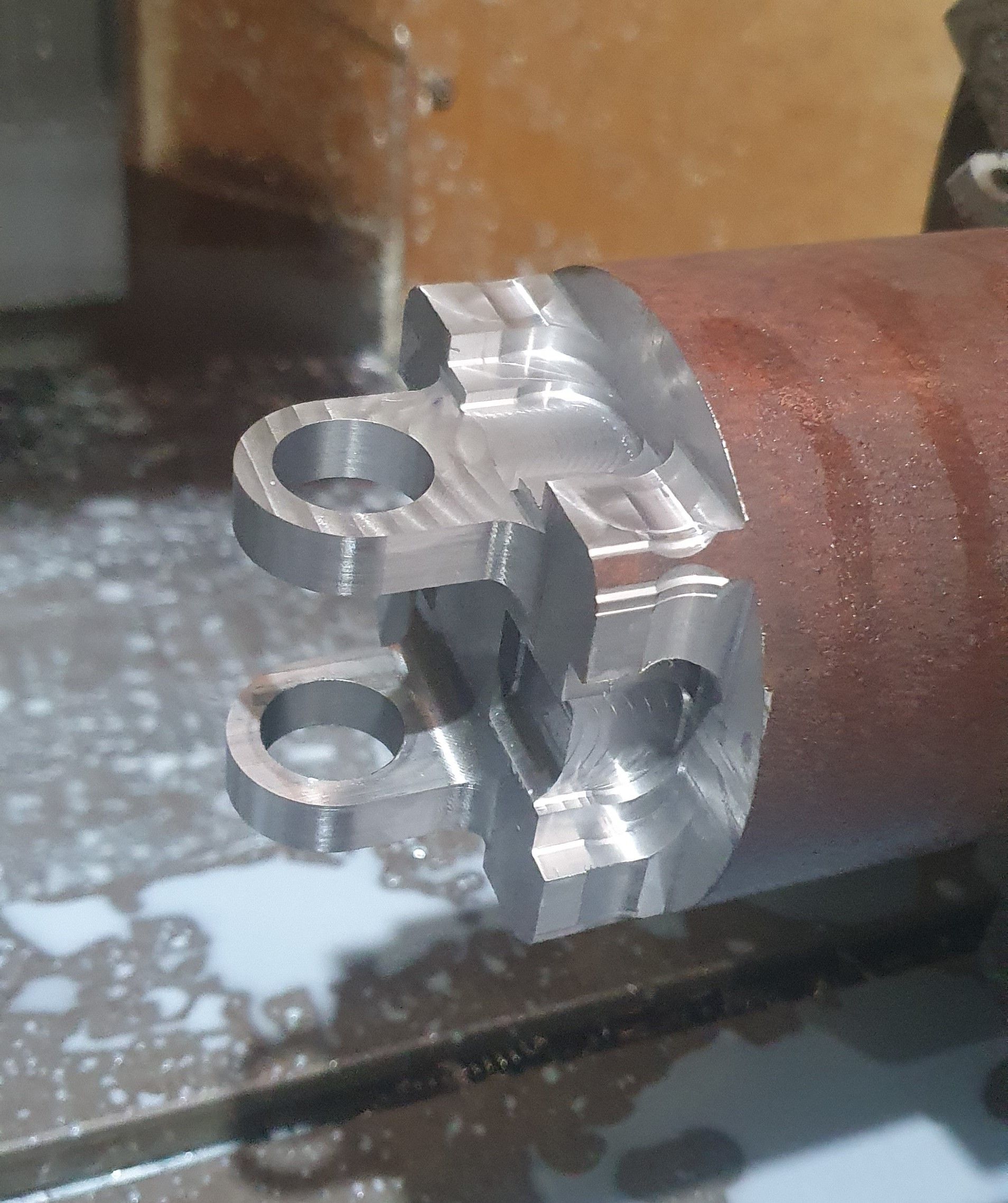 A close up of a piece of metal on a table.