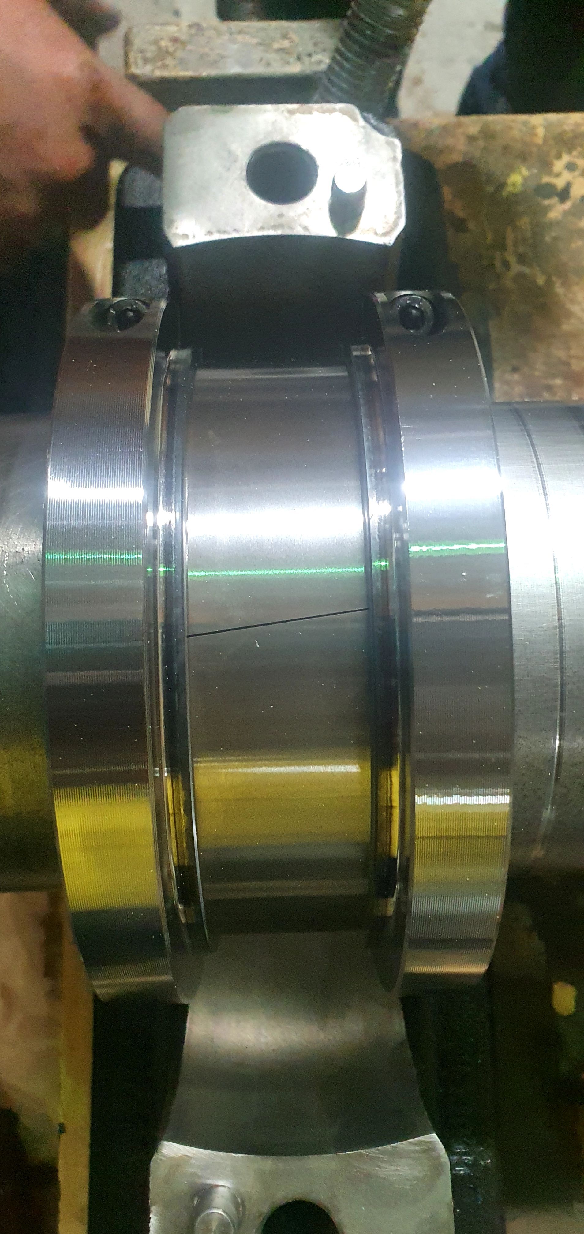 A close up of a metal object sitting on top of a table.