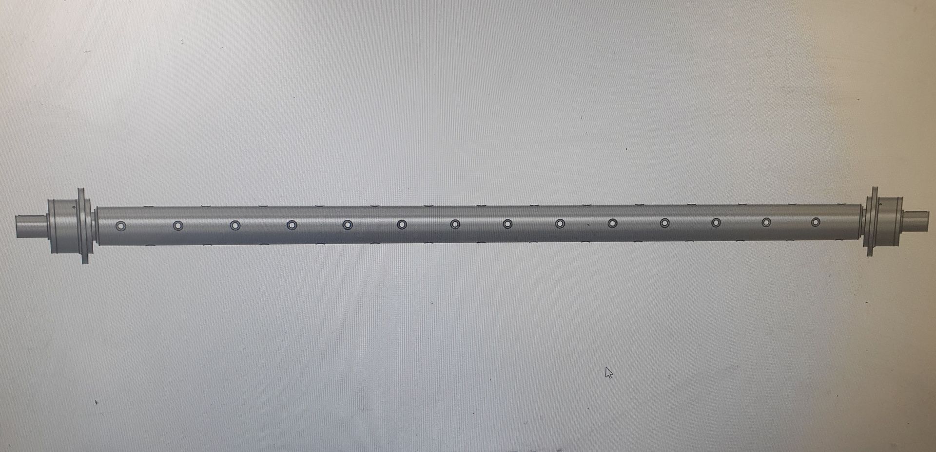 A black and white photo of a metal rod with holes in it.