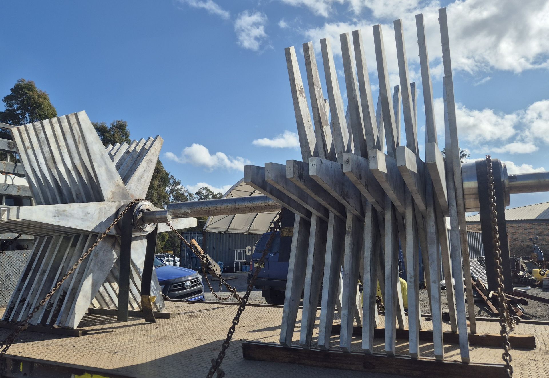 A stack of metal poles sitting on top of each other
