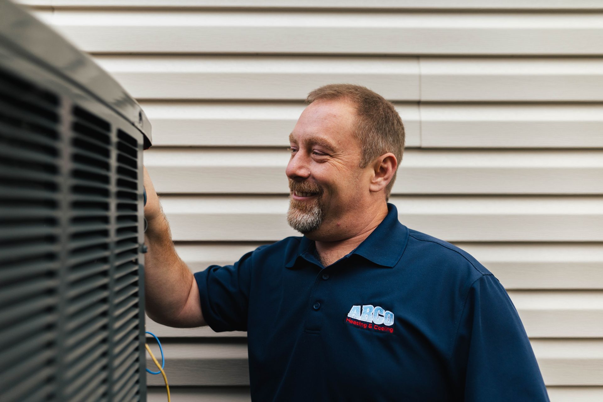 A man Diagnosing and outside air unit